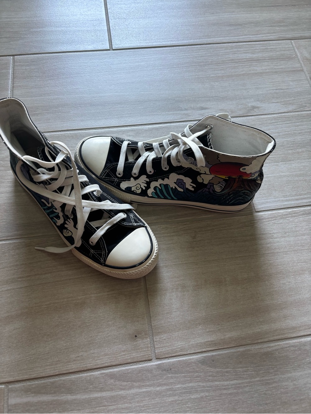 One-of-a-kind custom hand-painted high-top canvas sneakers from historic street
